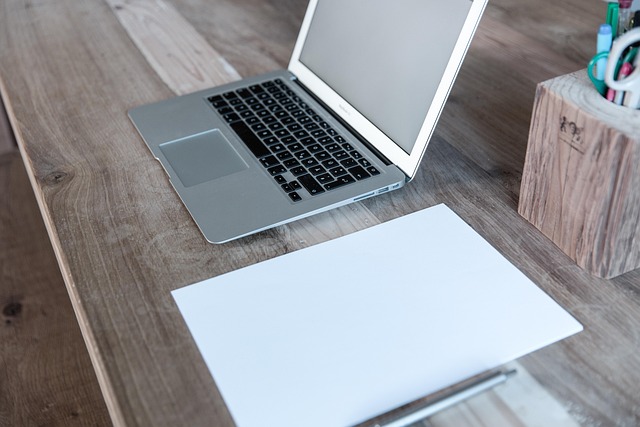 meeting room table with notebooks and neutral workspace environment